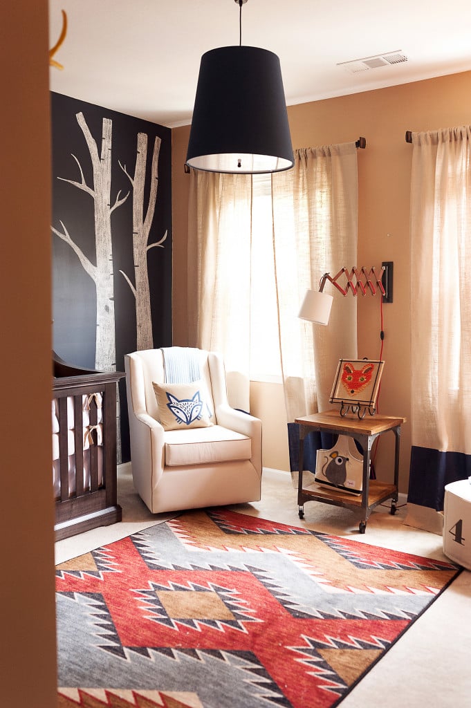 Yes, a viral pop hit can inspire a nursery. "The Fox (What Does the Fox Say)" supplied the theme for this appealingly rustic and whimsical space that pairs repainted vintage furniture finds with linens from Serena and Lily and artwork from Etsy. The key here is a clear concept and focused palette.