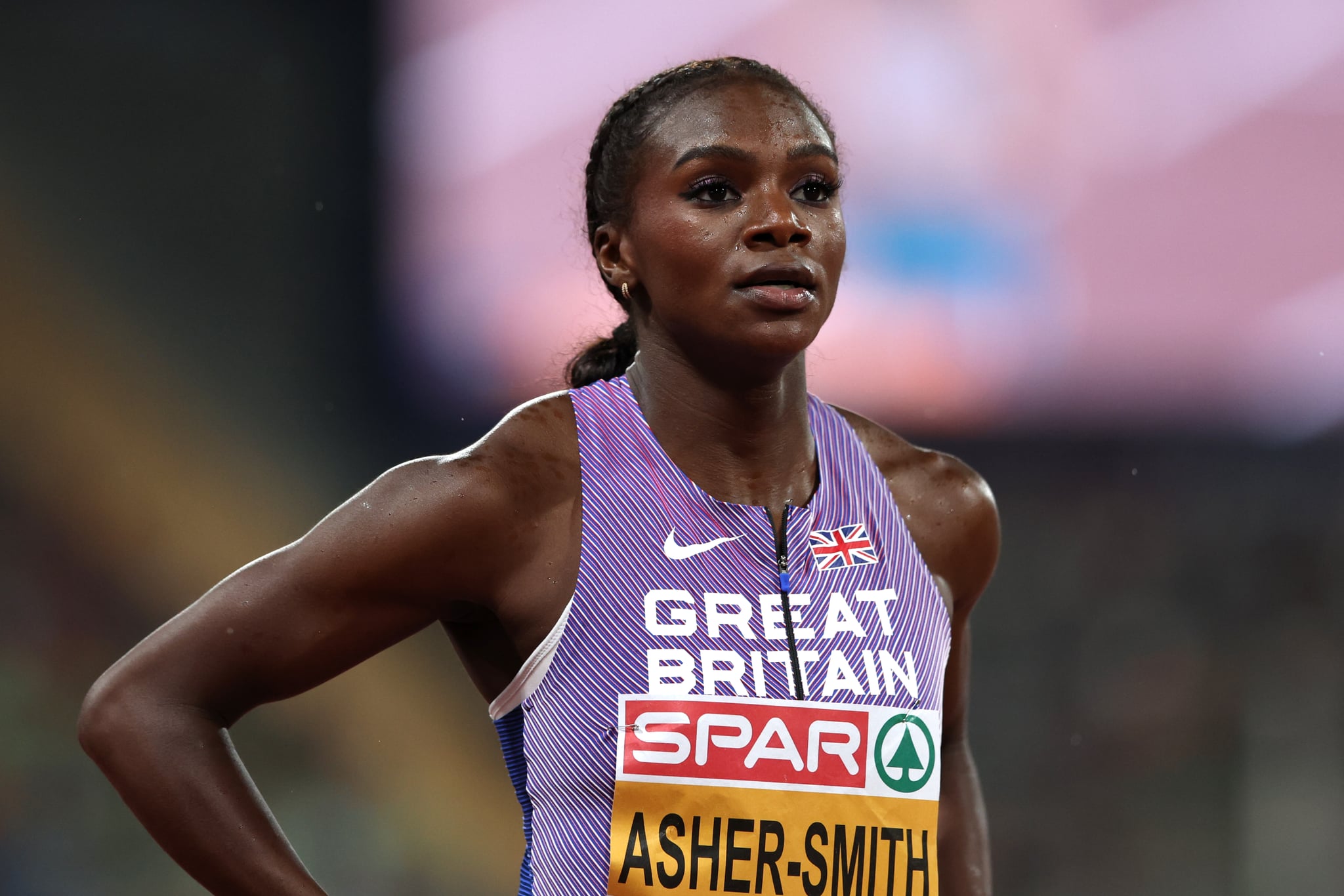 MUNICH, GERMANY - AUGUST 18: Dina Asher-Smith of Great Britain looks on after the Athletics - Women's 200m Semi Final 2 on day 8 of the European Championships Munich 2022 at Olympiapark on August 18, 2022 in Munich, Germany. (Photo by Maja Hitij/Getty Images)