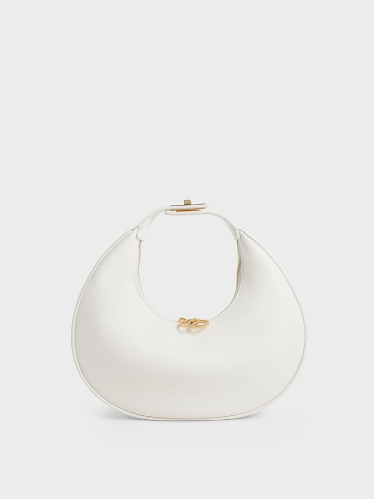 Charles & Keith Crescent Hobo Bag in White J Lo's White Fendi Suit at