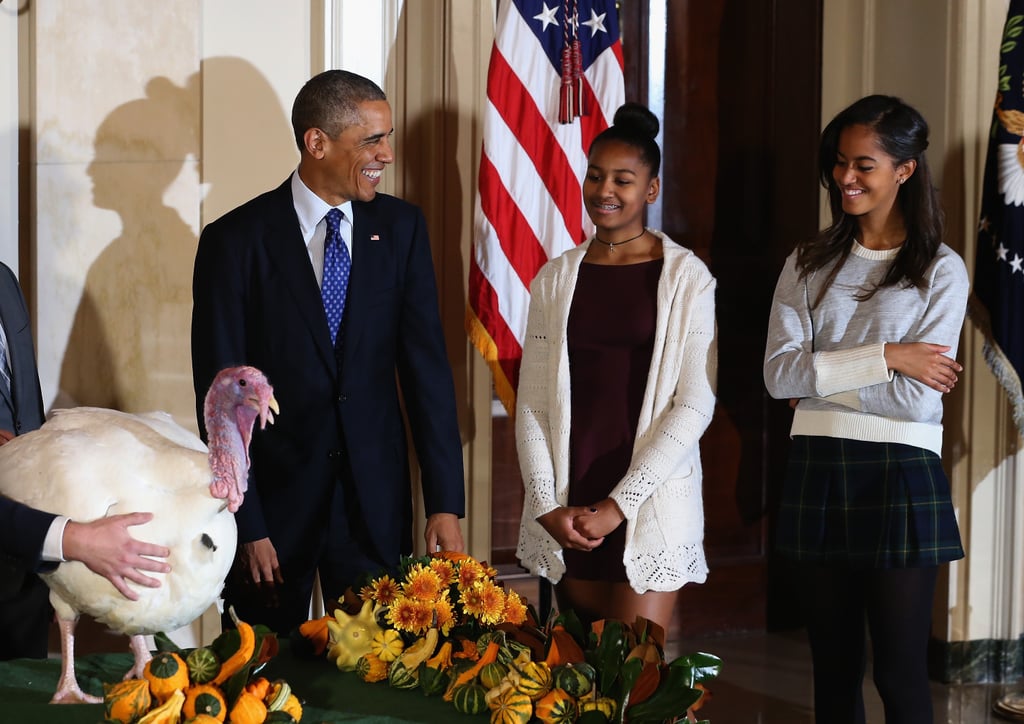 Malia and Sasha laughed as their dad pardoned the turkey on Thanksgiving.