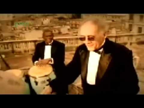 "I Still Haven't Found What I'm Looking For" by Rhythms del Mundo feat. U2 and Coco Freeman