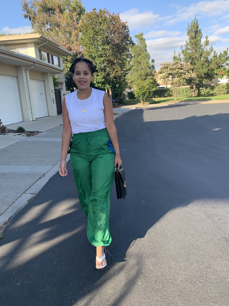 When I want to be a lil' extra, I pop on a heel. Here my track pants are paired with Nasty Gal heels, Missoma jewelry, a Burberry handbag, and my favorite white tee by Handvaerk.