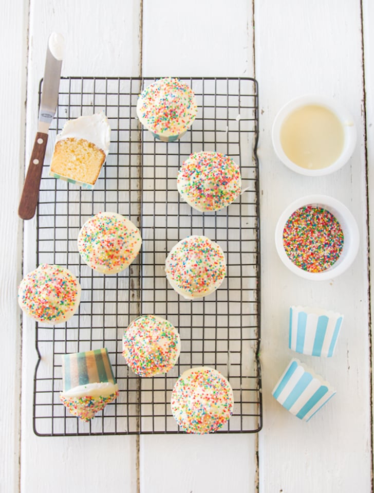 White Chocolate Hi-Hat Cupcakes With Rainbow Sprinkles White Chocolate Hi-Hat Cupcakes With Rainbow Sprinkles
