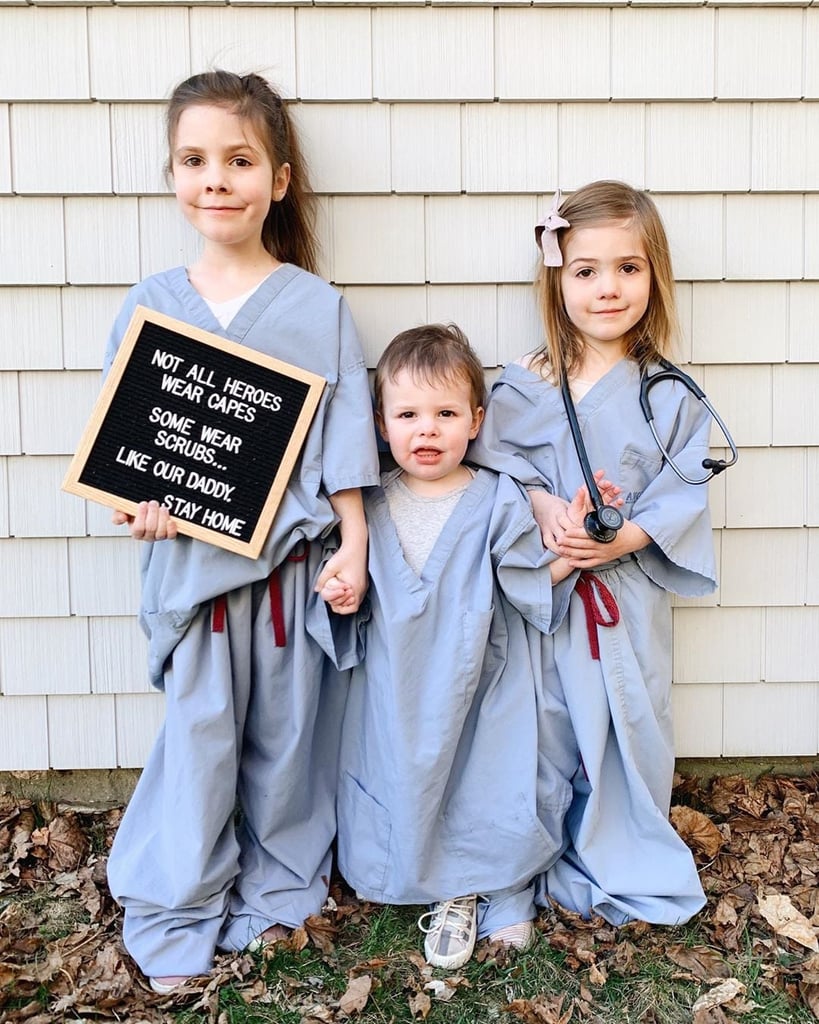 Mom of three Stephanie Scurlock posted a photo to Instagram of her three kiddos dressed in their dad's scrubs to illustrate the importance of social distancing. 
"It's pretty difficult to convey all of my feelings during this time," she wrote on Instagram in April. "So many thoughts. So many worries. But, I think this photo sums up the gist of it. To anyone on the healthcare front lines, you are our heroes and I am praying for your safety, both physically and mentally."