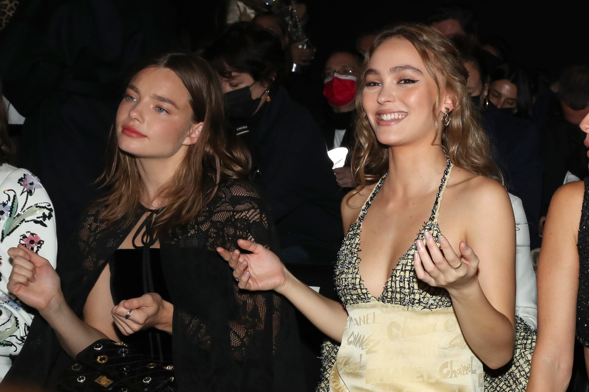 PARIS, FRANCE - OCTOBER 05: (EDITORIAL USE ONLY - For Non-Editorial use please seek approval from Fashion House) Kristine Froseth and Lily-Rose Depp attend the Chanel Womenswear Spring/Summer 2022 show as part of Paris Fashion Week on October 05, 2021 in Paris, France. (Photo by Bertrand Rindoff Petroff/Getty Images)