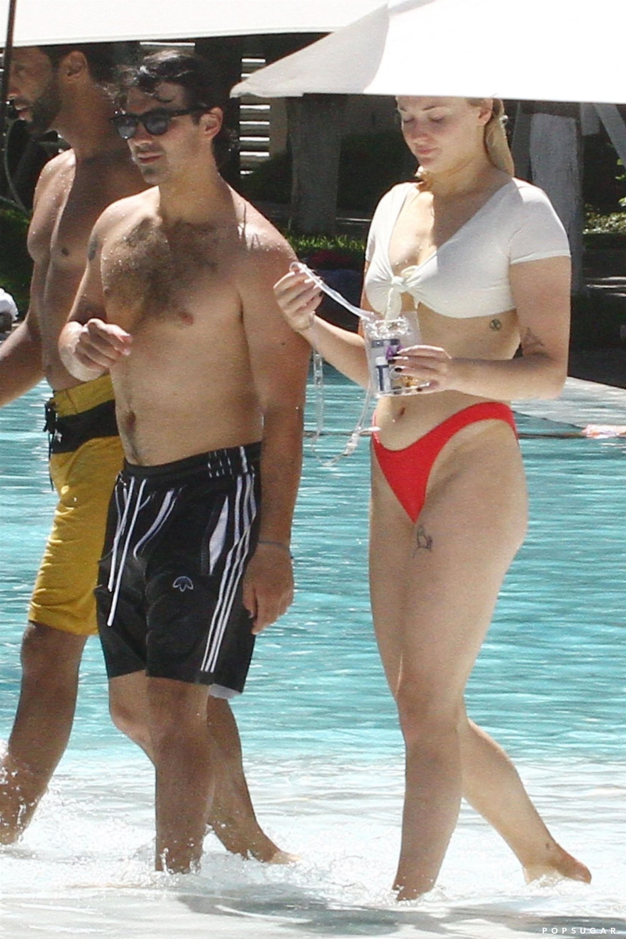 Sophie Turner In White Corset Top: Shows PDA With Joe Jonas In
