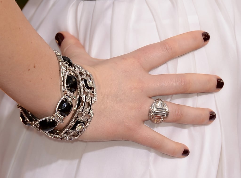 Jennifer Lawrence wore layered diamond bracelets and an antique-looking cocktail ring from Neil Lane.