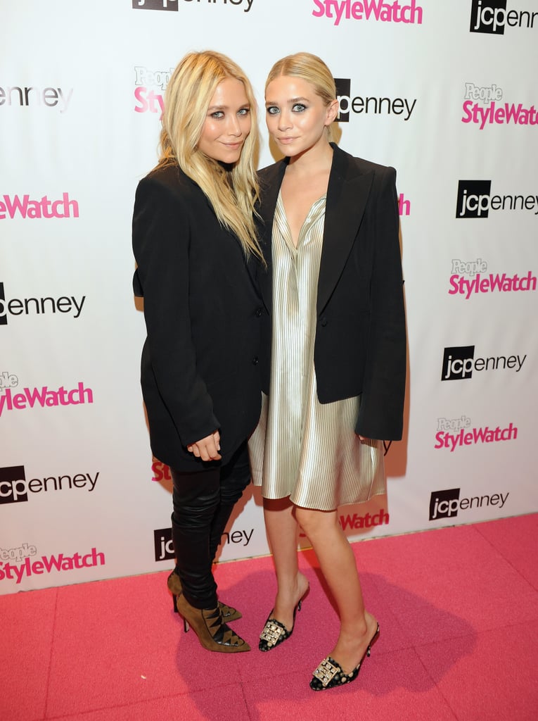 Twinning combo: It was all about a statement-making shoe for the JCP People Stylewatch event in September 2011.

Mary-Kate went rocker-chic in black leather pants, an oversize blazer, and tribal suede ankle boots.
Ashley polished off her pinstriped silk shirtdress with ornate printed pumps.