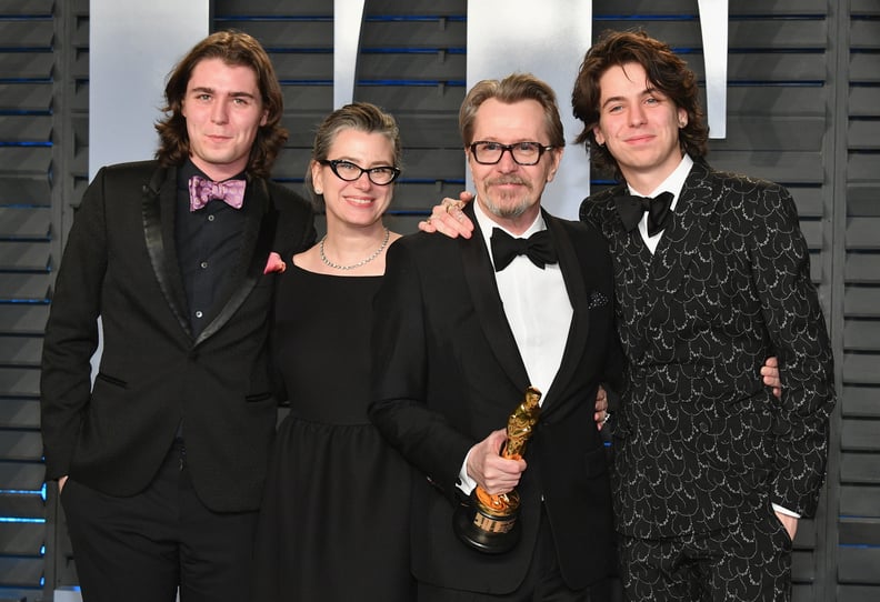 BEVERLY HILLS, CA - MARCH 04:  (L-R) Gulliver Oldman, Gisele Schmidt, Gary Oldman and Charlie Oldman attend the 2018 Vanity Fair Oscar Party hosted by Radhika Jones at Wallis Annenberg Center for the Performing Arts on March 4, 2018 in Beverly Hills, Cali