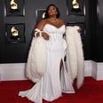 Sorry, Lizzo Couldn't Carry a Tiny Bag With This Badass Furry Stole