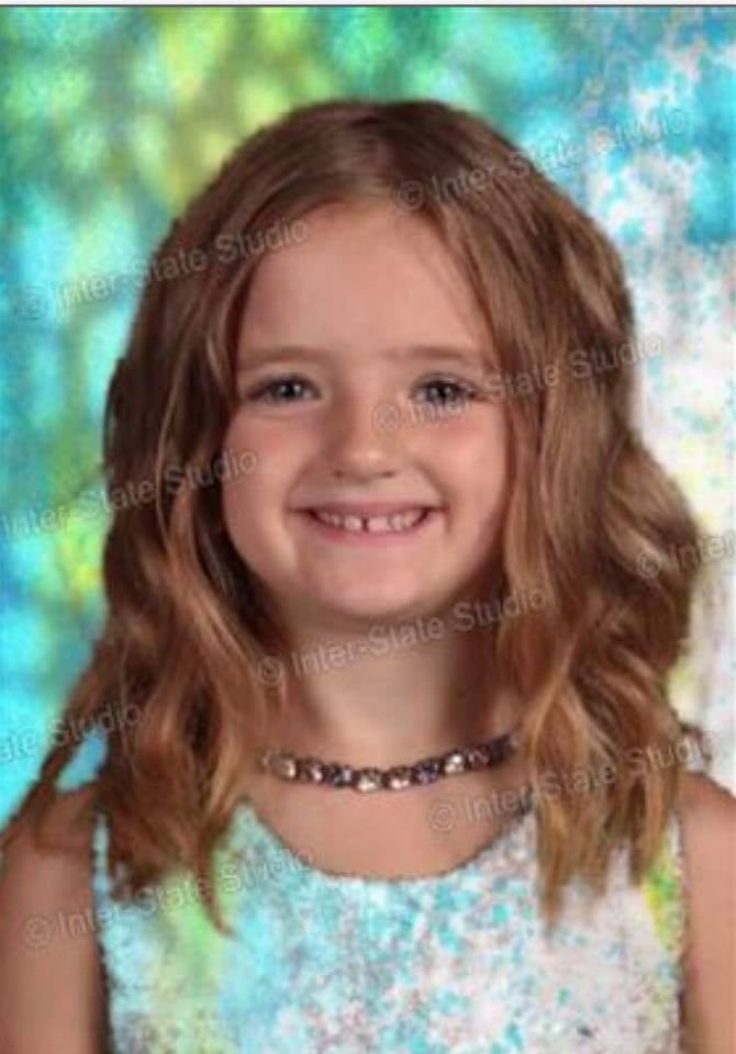Girl's School Picture Day Green Screen Mistake