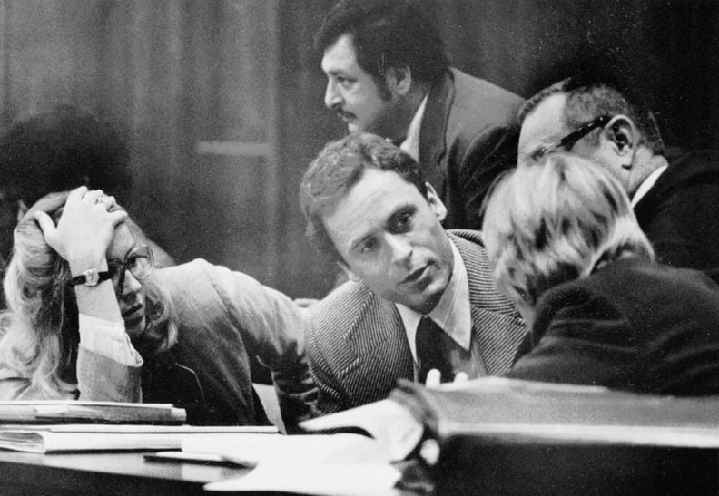 (Original Caption) Accused murderer Theodore Bundy (C) confers with his defense attorneys on the opening day of his trial 6/25. The trial will be televised nationwide as Bundy participates in his own defense, drawing on his experience as a law student. Bu