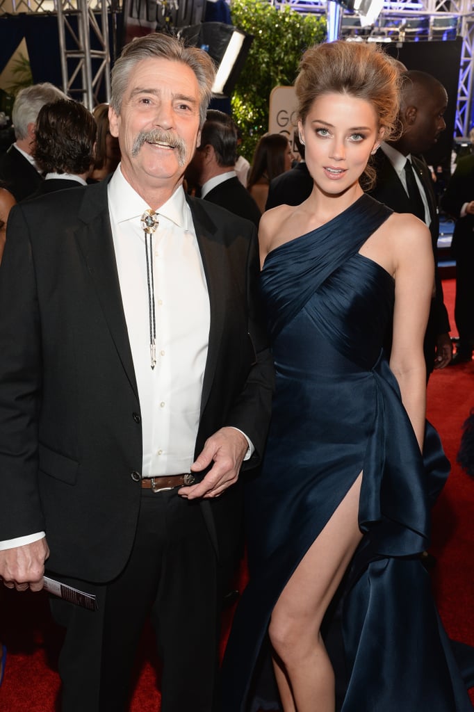 Amber Heard posed with her dad, David, on the red carpet at the Globes.