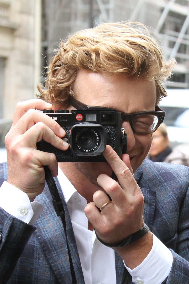 Here he is taking your photo after telling you how gorgeous you look today.