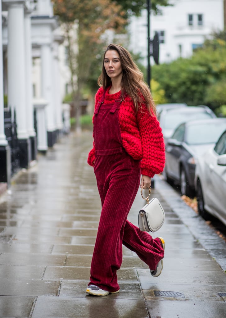 Overalls and a chunky knit in a slightly different tone bring your look a playful touch.
