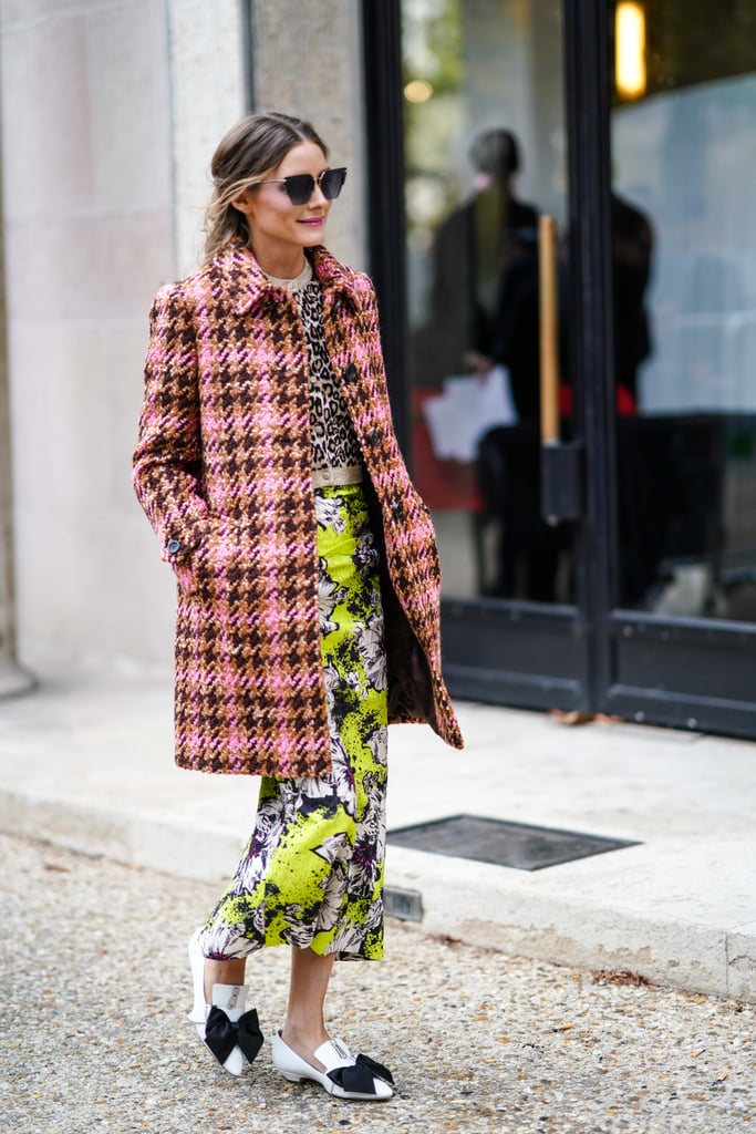 If this isn't flat-out fun fashion, what is? Olivia put her signature spin on quirky prints and ladylike separates at Paris Fashion Week for a playful outfit that didn't short on the cool factor. We're also seriously smitten with those bow-adorned flats.