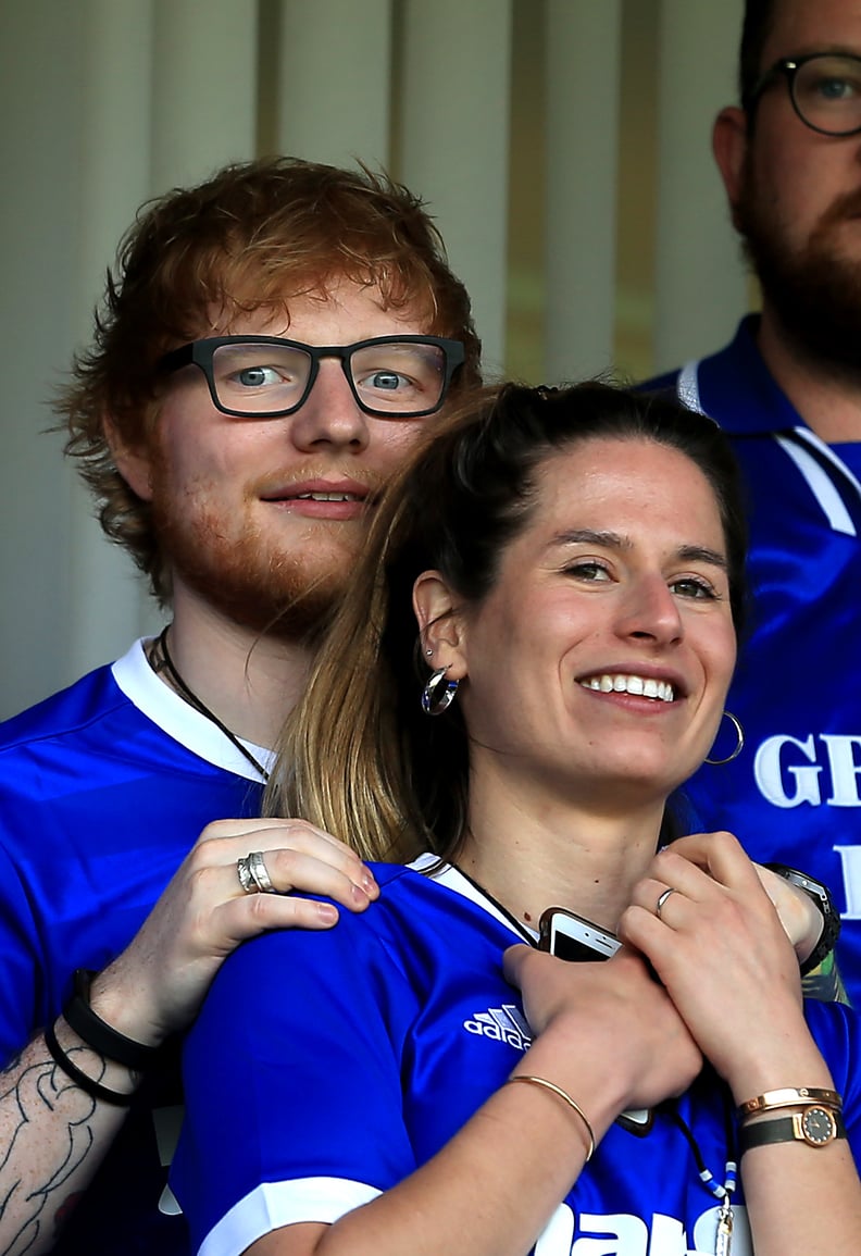 IPSWICH, ENGLAND - APRIL 21:  Musician Ed Sheeran and fiance Cherry Seaborn look on during the Sky Bet Championship match between Ipswich Town and Aston Villa at Portman Road on April 21, 2018 in Ipswich, England. (Photo by Stephen Pond/Getty Images)