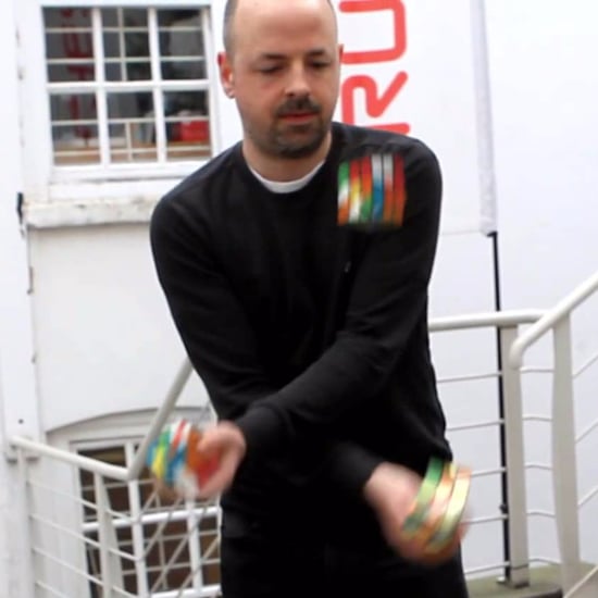 Man Juggles While Solving Rubik's Cube