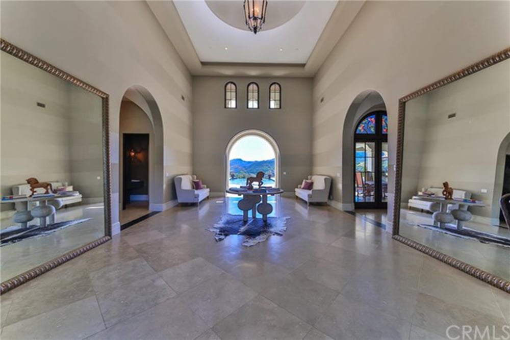 Arched doorways give the mansion that Mediterranean feel.