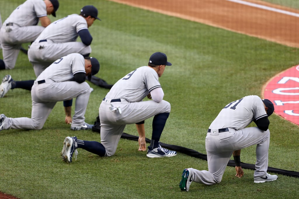 See MLB Players Kneel For Racial Justice on Opening Day