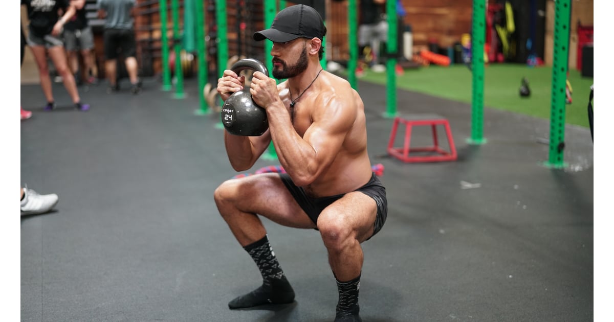 TwoHanded Horned Squat Beginner Kettlebell Guide POPSUGAR Fitness
