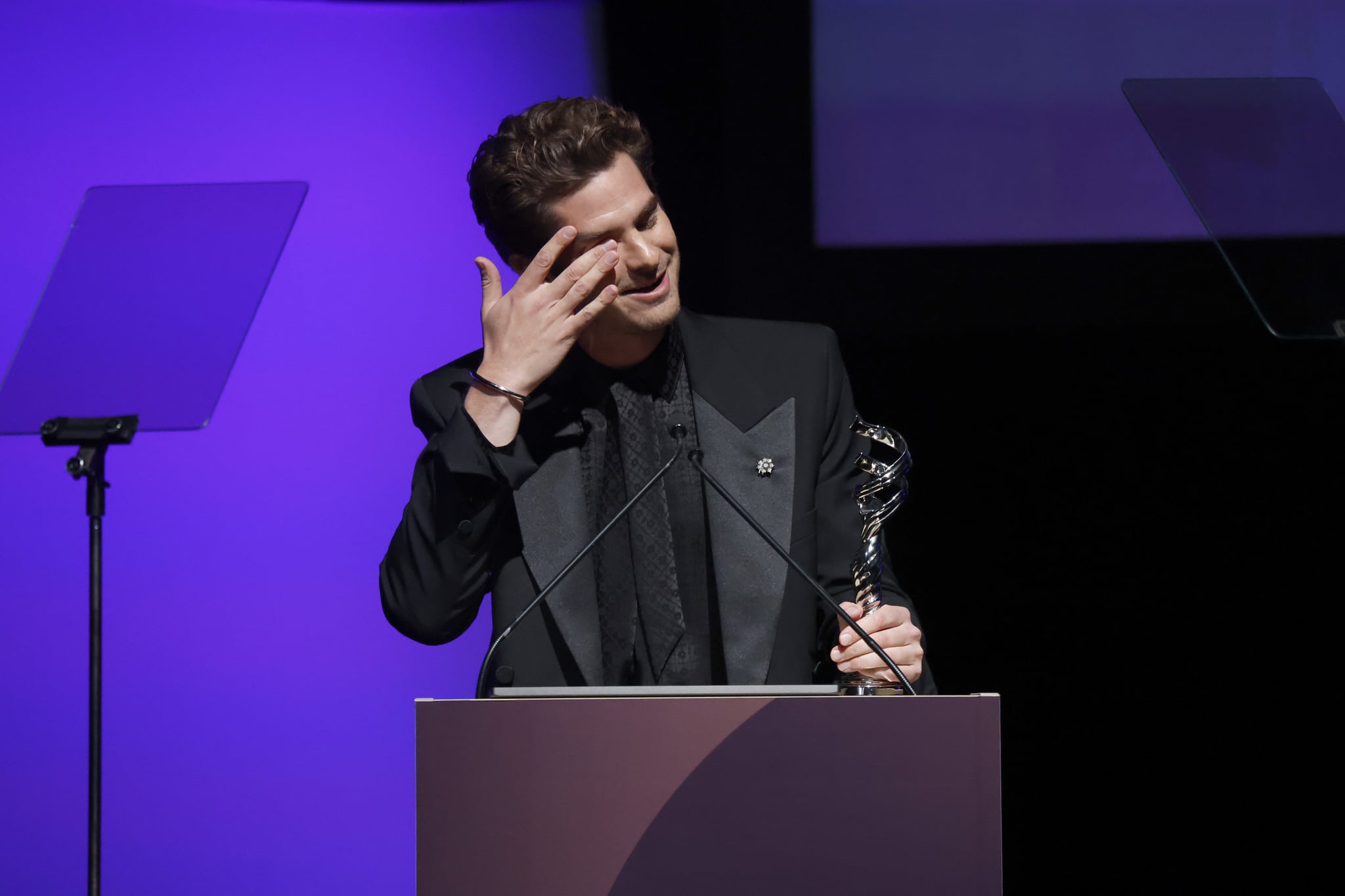 SANTA MONICA, CALIFORNIA - MARCH 09: Andrew Garfield is seen onstage during the 24th CDGA (Costume Designers Guild Awards) on March 09, 2022 in Santa Monica, California. (Photo by Frazer Harrison/Getty Images)