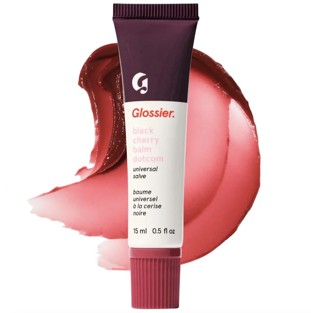 Glossier Black Cherry Balm Dotcom Lip Balm ($16)
Your lips deserve love whether you're kissing someone else or not. Treat them to a product that's both yummy and nourishing with this Balm Dotcom salve from Glossier. The black cherry flavoring is so decadent, and the formula glides on smooth.