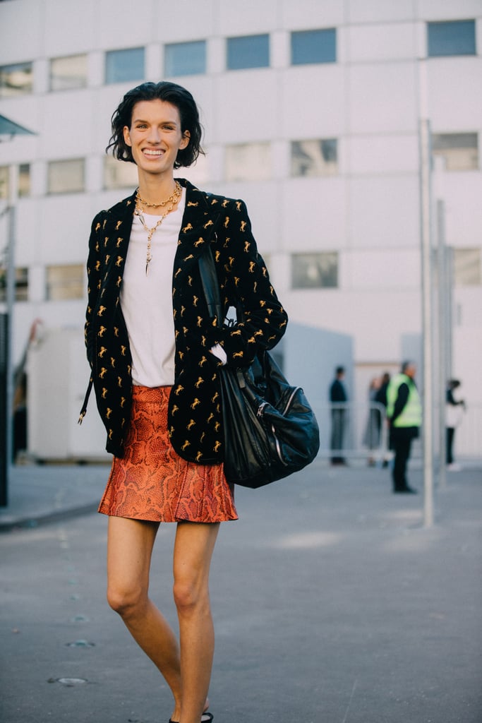 A luxe blazer dresses up a t-shirt and miniskirt combo.
