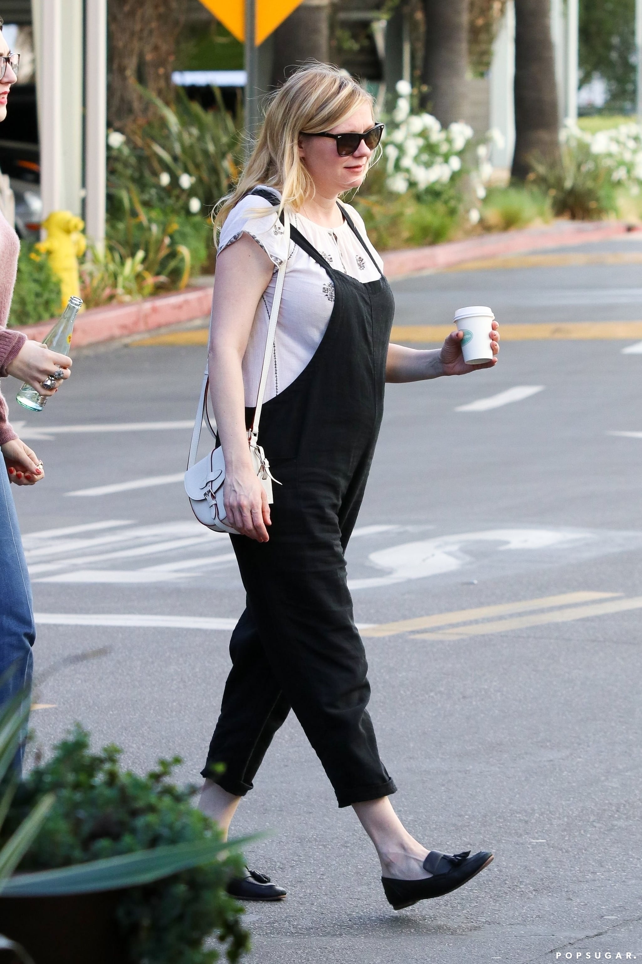 Making Overalls Look Cool Again With Black | Kirsten Dunst's Dreamy, Bohemian Style Is Literally Maternity Style Is All About | Fashion Photo 7