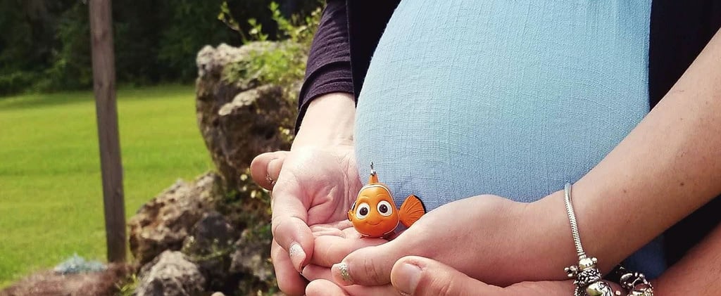 Pregnant Woman Posing With Finding Nemo Figurine