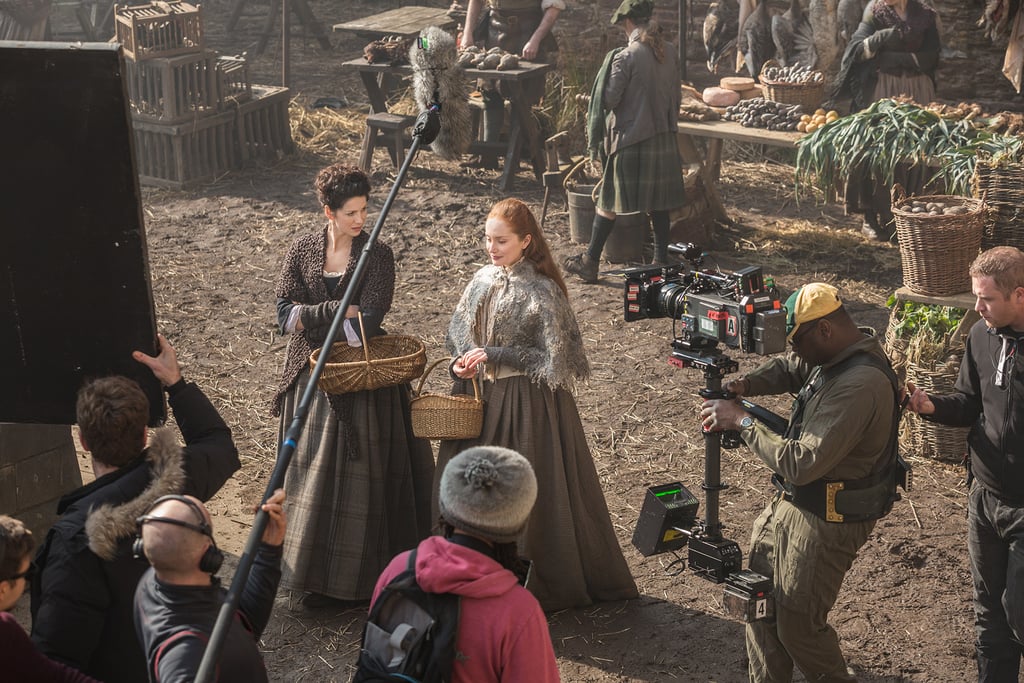 A behind-the-scenes shot of Claire and Geillis.