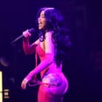 Cardi B Shows Off Her Butt Tattoos in a Plunging Lace-Up Catsuit