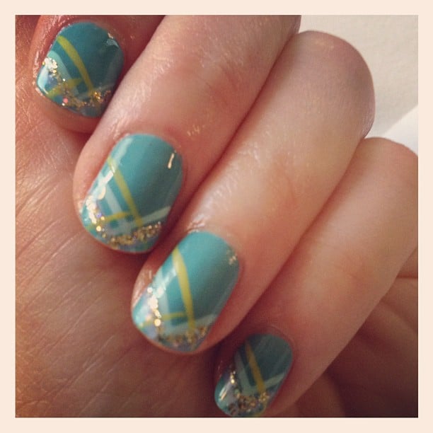 For this crisscross design, Zooey pulled in blues, greens, and glitter for a Spring-inspired manicure. 
Source: Instagram user ZooeyDeschanel