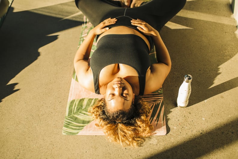 woman doing yin yoga for health benefits