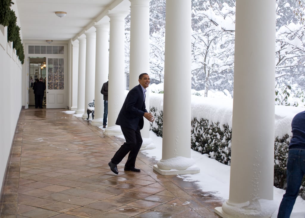 Taking a break from state affairs to pelt Chief of Staff Rahm Emanuel with a snowball.