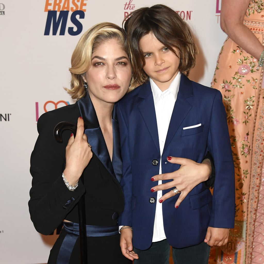 Selma Blair is opening up about parenting with a chronic illness, and it's incredibly raw. In a new interview with People, the 47-year-old actress shares how her multiple sclerosis diagnosis changed her life and her relationship with her son Arthur Saint Bleick. "He's had to endure a lot; he's seen a lot," Selma told the publication, explaining that he's witnessed her "fall down the stairs" and "rush to a bathroom if she's feeling sick," so there's no keeping secrets from him. 
"This is it. The only life we get," she said. "My disease isn't a tragedy, but I tell myself, 'You're going to live in a way that would be an example for yourself and your son.'" And for Arthur, who turns 8 this week, that means visiting him at school and engaging with his friends when they ask "why she walks and talks funny."
She said, "I explain what's happening and that my voice doesn't hurt, and we have really decent exchanges. I had no idea Arthur was proud of that. I thought 'I'm probably an embarrassment,' but to know I'm not was one of my proudest moments." So sweet. It's presumably difficult for Selma to have these exchanges with her son's classmates, but Arthur doesn't see his mom's illness that way. "He says, 'Mommy's not sick. Mommy's brave,'" she said. And she most definitely is brave.
Selma has been open about life with MS both on social media and in interviews over the last year. Whether it's her doing a makeup tutorial, walking with a cane on the Oscars red carpet, or getting real about parenting on Instagram, it's her candidness that is so appreciated by fans and anyone living with a chronic illness themselves. Check out some of Selma and Arthur's sweet photos ahead.

    Related:

            
            
                                    
                    
                            

            Selma Blair&apos;s First Interview About Life With Multiple Sclerosis Should Be Required Viewing