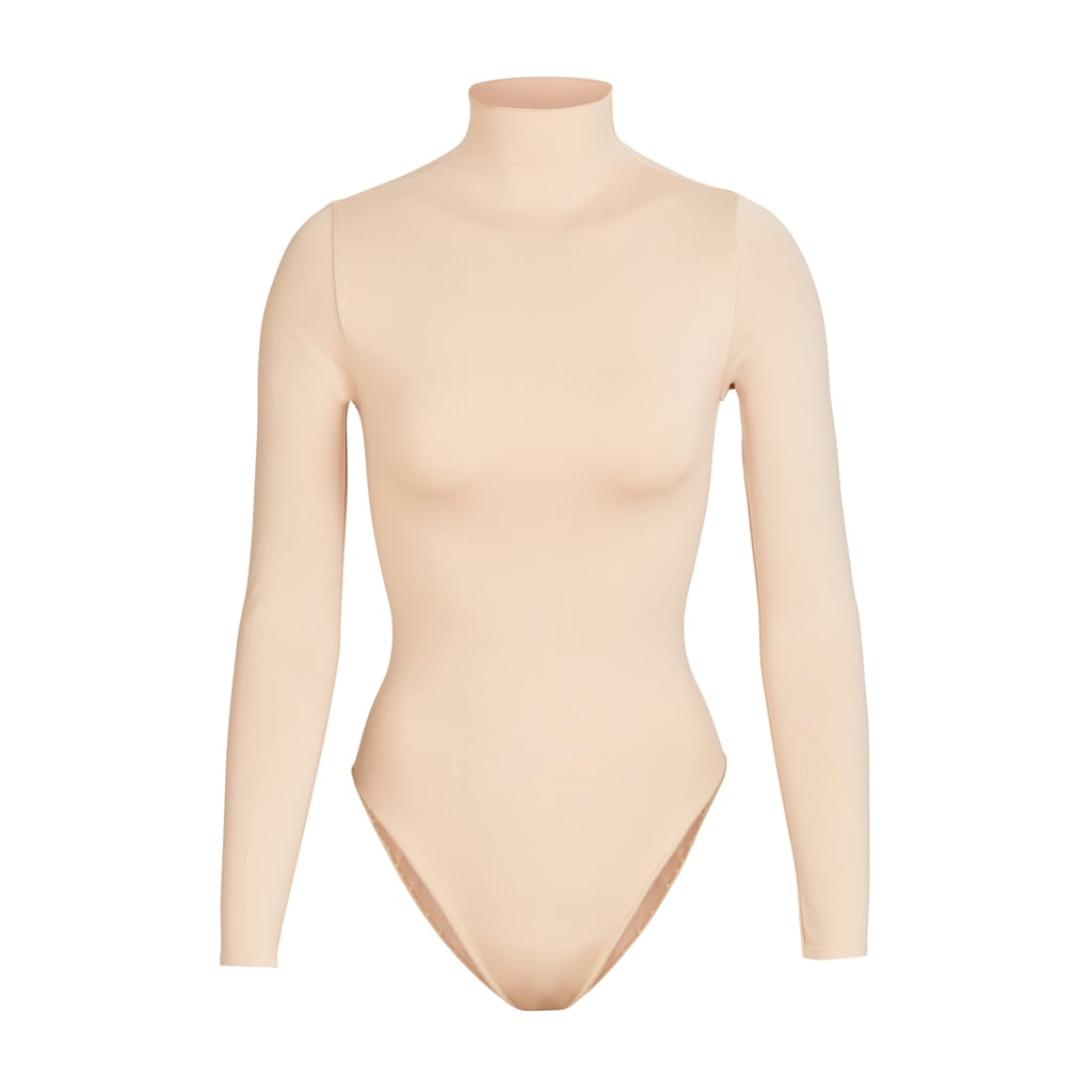 SKIMS Long Sleeve Mock Neck Bodysuit in Sandstone