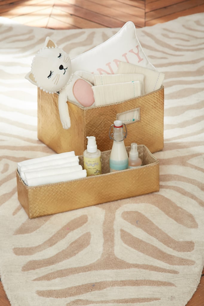 On how to add style to a nursery without a clue as to where to begin: "Sticking to a graphic, bold palette, like black and white, makes mixing and matching pops of color and little prints like stars, hearts, stripes, and florals easy. You should pick decor that has the perfect balance of timelessness and playfulness. Gold accessories and accents are another great and easy way to add style to a room. Use gilded frames to highlight cute black and white animal silhouettes or glamorous gold dipped trays to store diapers and wipes."