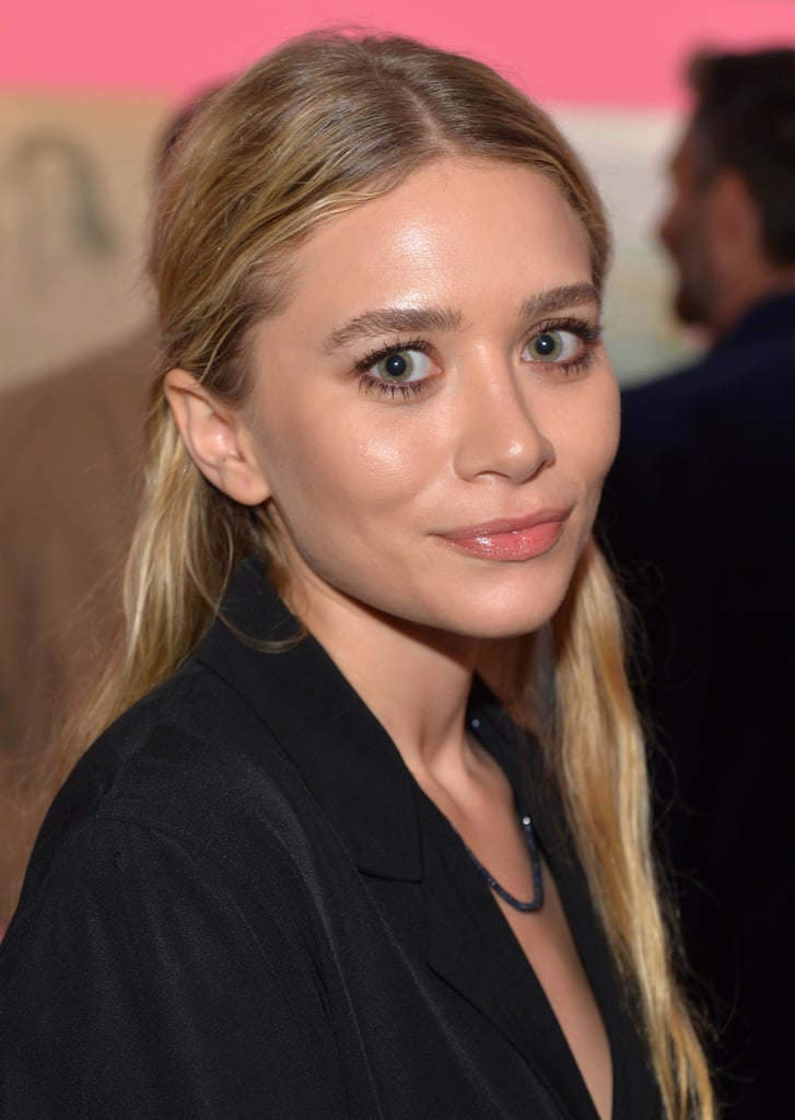 A rare appearance from Ashley Olsen saw her in her signature style: a boho updo, glossy lips, and a bronze smoky eye.