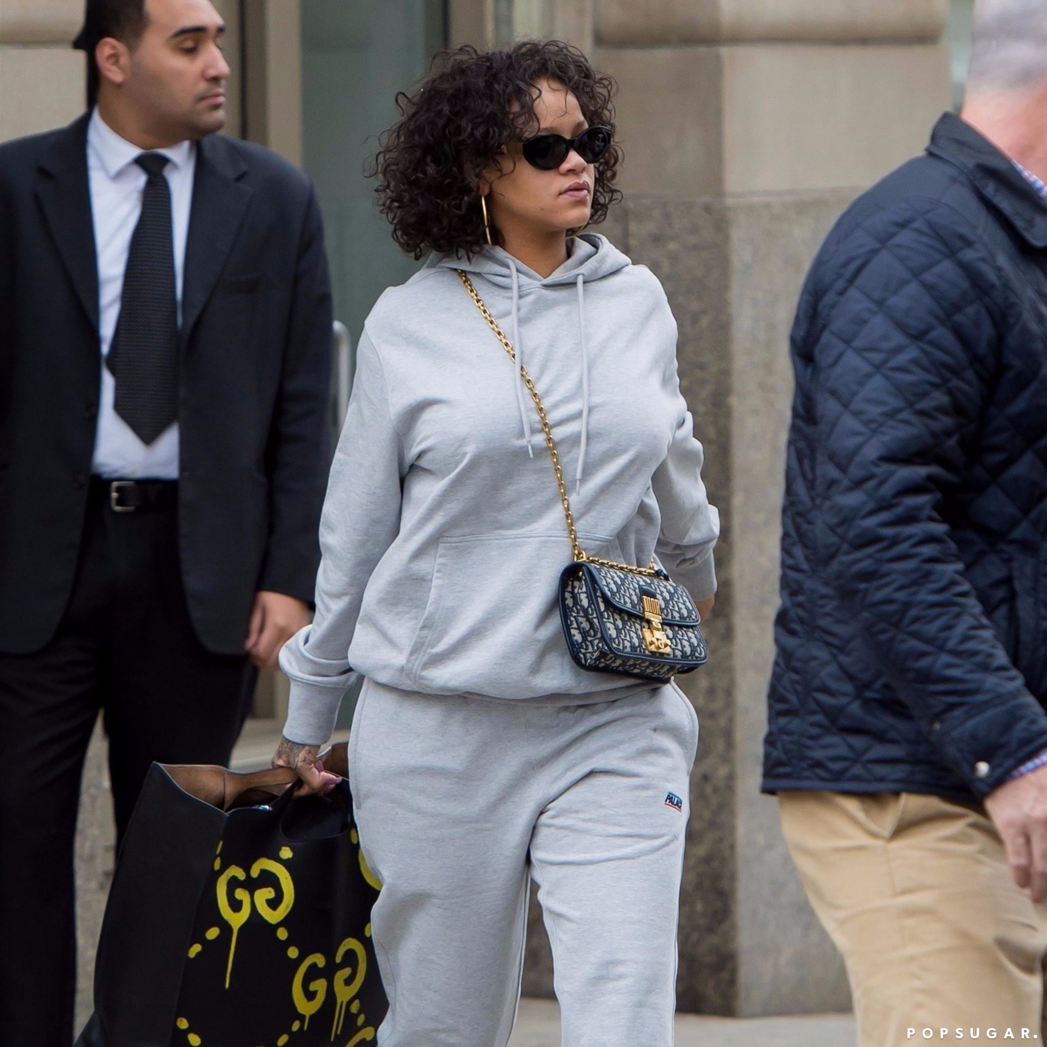 Rihanna Carrying Gucci Graffiti Handbag 