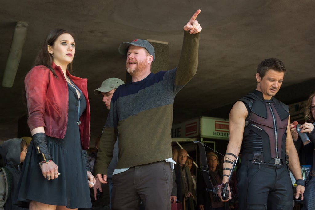 Director Joss Whedon talks with star Olsen on the set.