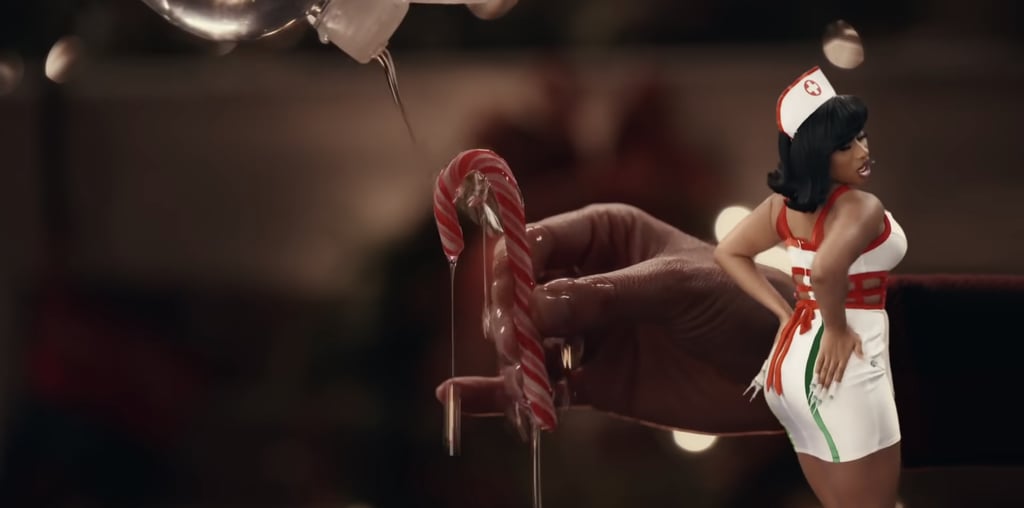Megan Thee Stallion's Booster Nails in Christmas Music Video