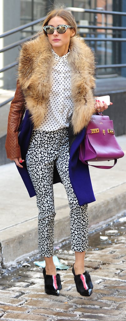Olivia smartly paired her Banana Republic trousers with a traffic-stopping Delvaux satchel.