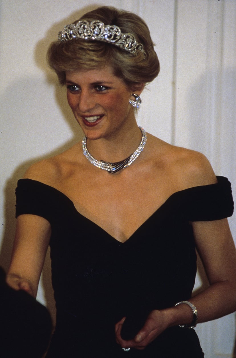 BONN, GERMANY - NOVEMBER 02:  Diana, Princess of Wales, wearing the Spencer family tiara and crescent shaped diamond and sapphire earring, necklace and bracelet given to her by the Sultan of Oman and a dress designed by Victor Edelstein, attends a banquet