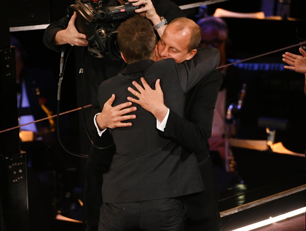 Sam Rockwell hugged his Three Billboards costar and best supporting actor winner Sam Rockwell.