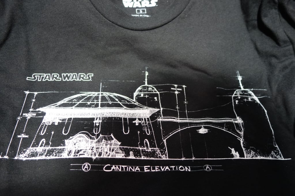 Of all the architecturally inspired designs, this Cantina tee was our favorite. Don't be too sad you didn't get one — it's only two more years till we experience it IRL!