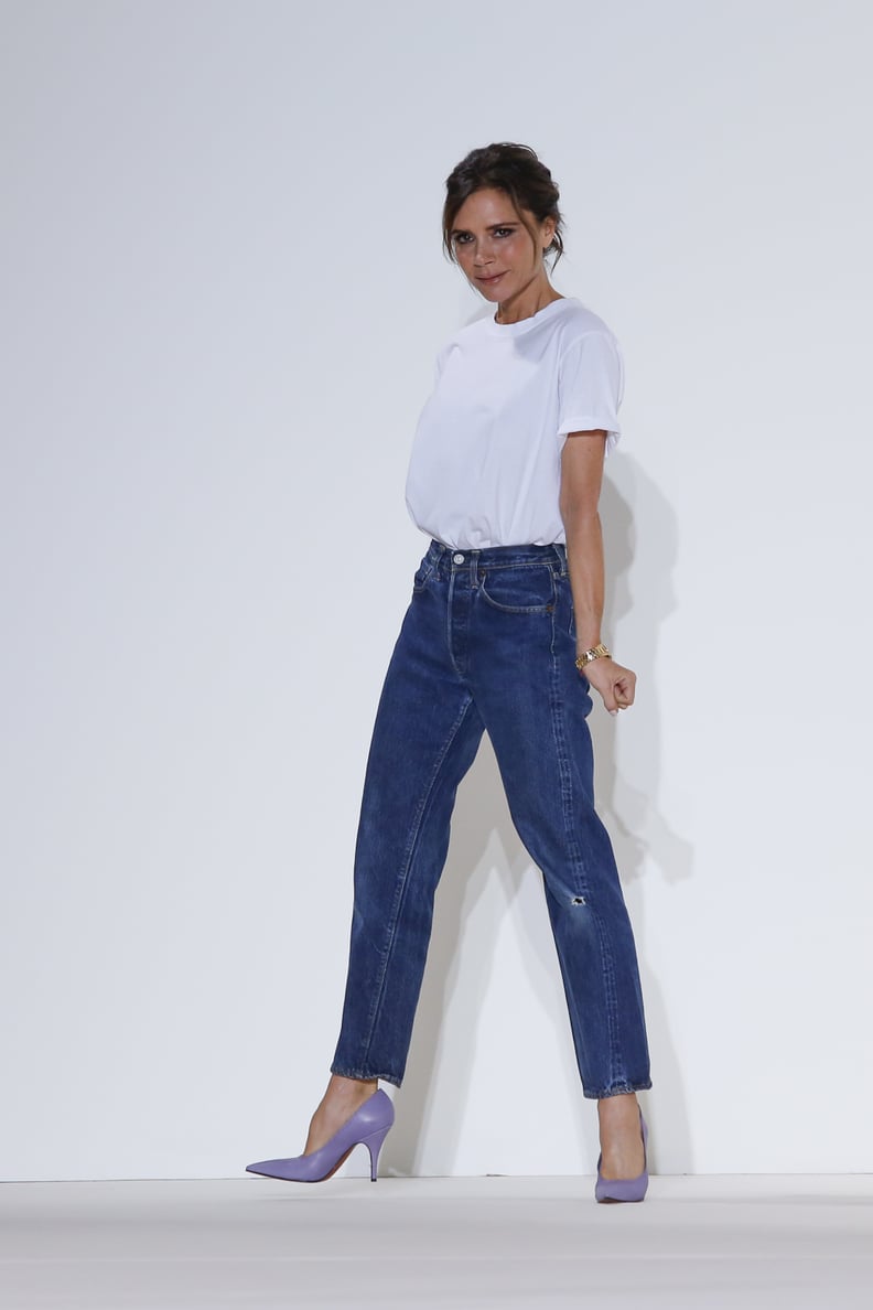 Victoria Beckham Took a Bow, Wearing a White Tee Tucked Into a Pair of Mom Jeans
