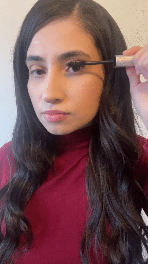 woman using Joah Beauty High Roller Legendary Volume Mascara
