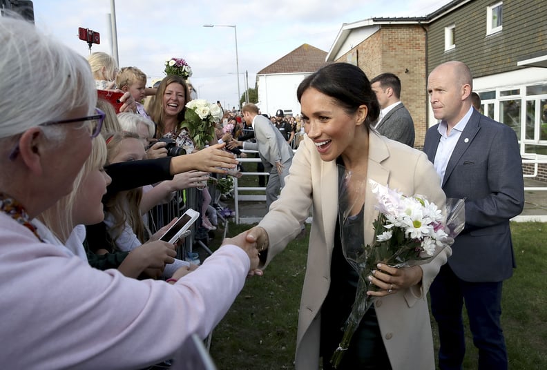 PEACEHAVEN, UNITED KINGDOM - OCTOBER 03:  Meghan, Duchess of Sussex makes an official visit to the Joff Youth Centre in Peacehaven, Sussex on October 3, 2018 in Peacehaven, United Kingdom. The Duke and Duchess married on May 19th 2018 in Windsor and were 