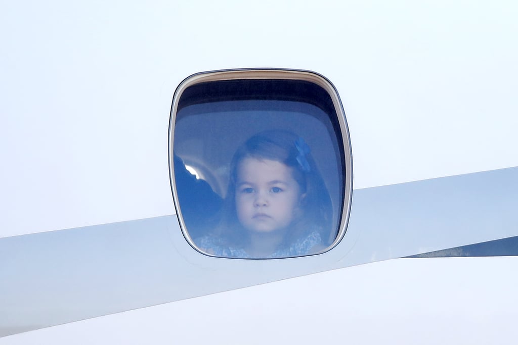 George and Charlotte Looking Out of Plane Windows Pictures